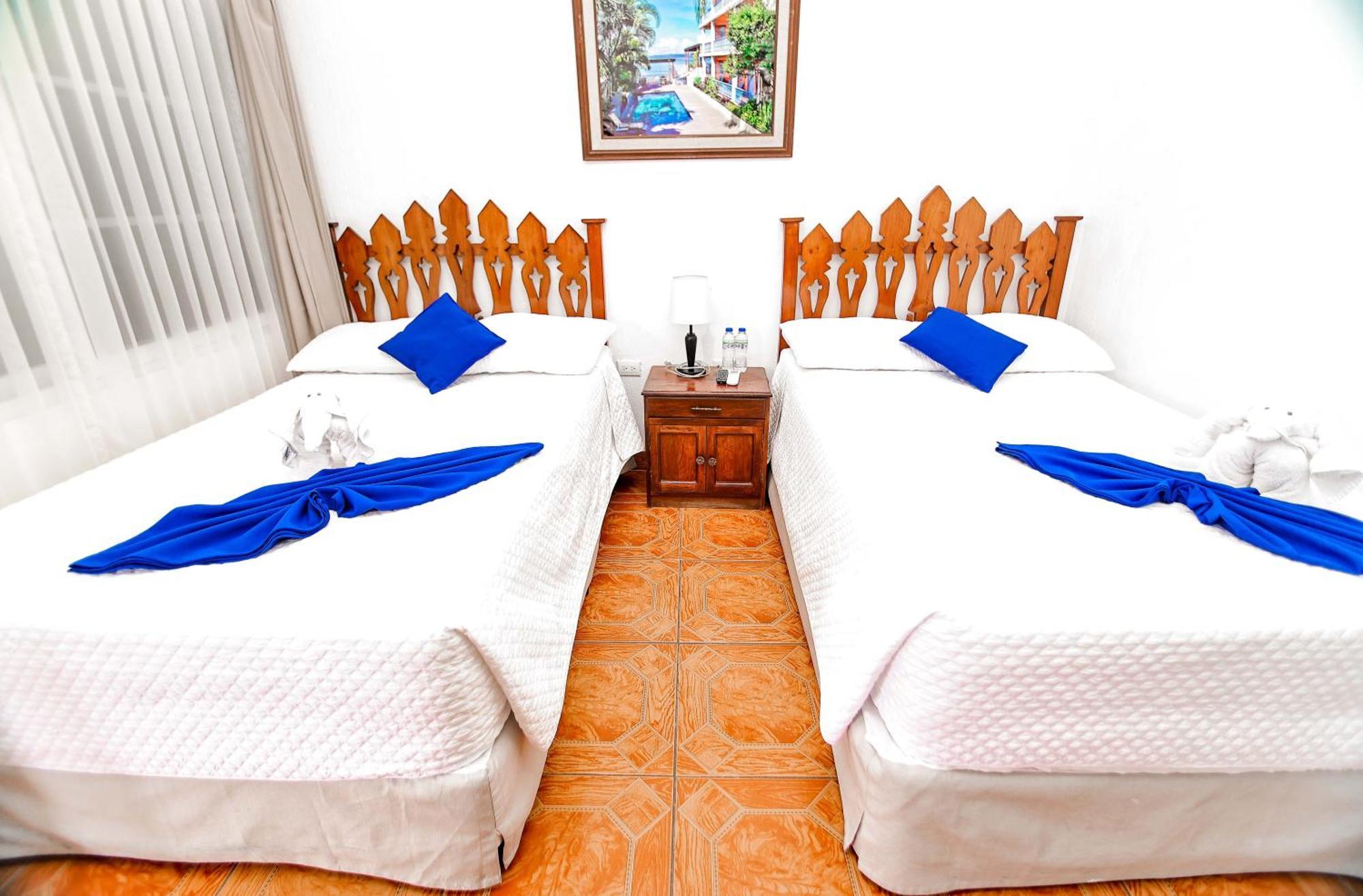 Hotel Villa Del Lago Flores Extérieur photo