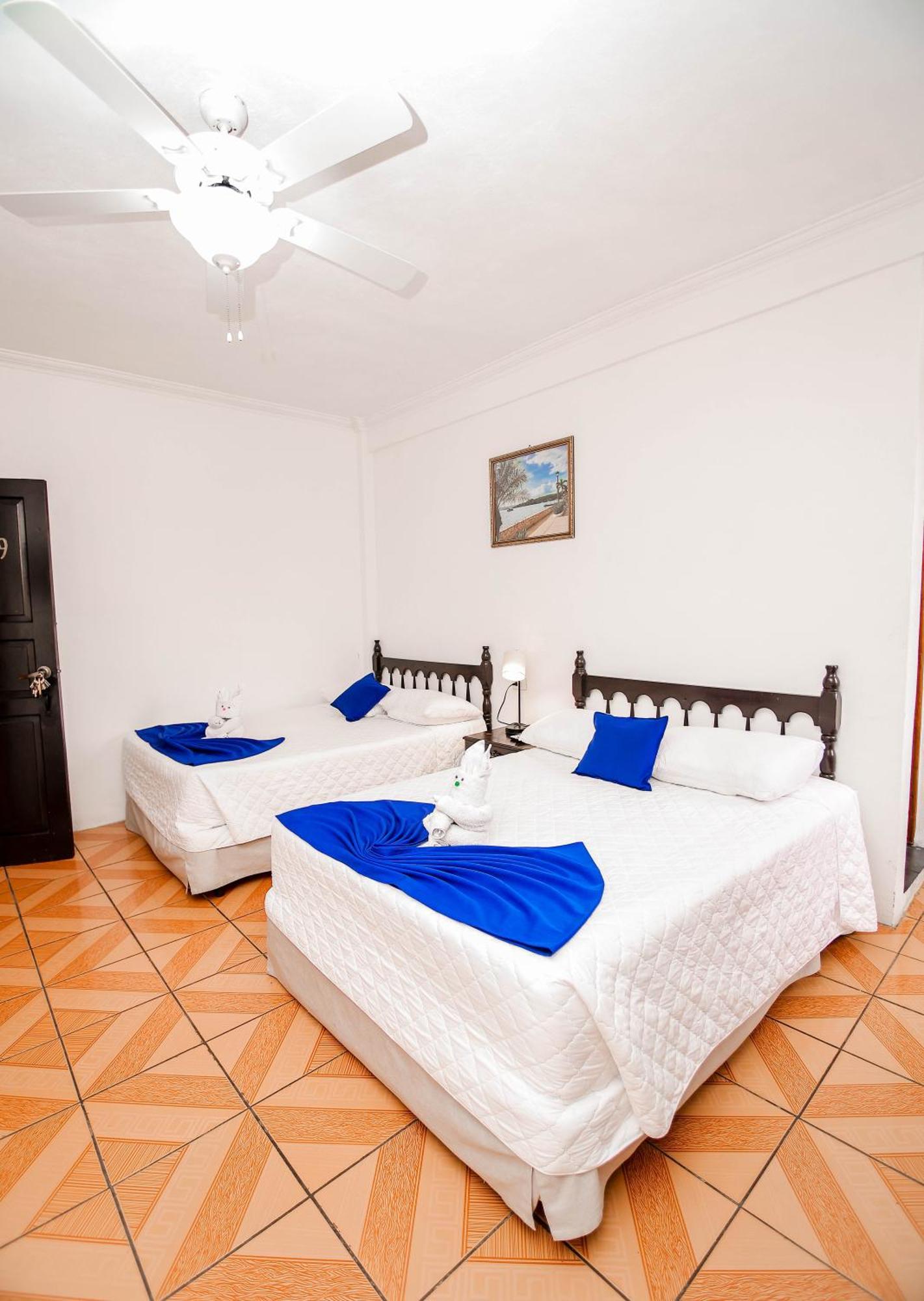 Hotel Villa Del Lago Flores Extérieur photo